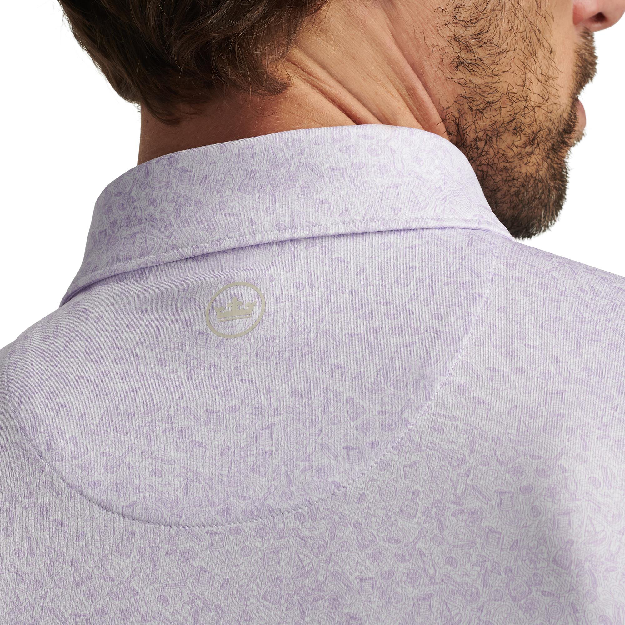 Close-up of model back showing Peter Millar logo and collar – luxury mens golf polo shirt